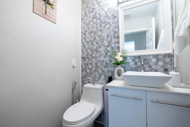 45801 Henley Dr, Canton, MI 48187 - half bathroom featuring vanity and toilet