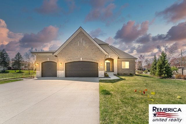 52951 Royal Park Ave, Utica, MI 48315 - french country inspired facade with brick siding, a garage, a yard, and concrete driveway