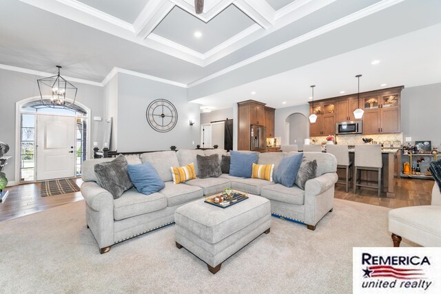 52951 Royal Park Ave, Utica, MI 48315 - living area featuring arched walkways, light wood finished floors, recessed lighting, beam ceiling, and coffered ceiling