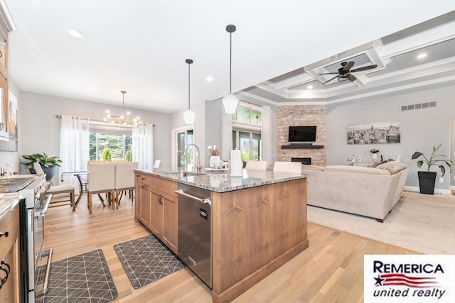 52951 Royal Park Ave, Utica, MI 48315 - kitchen with stainless steel appliances, a ceiling fan, a stone fireplace, light wood-style flooring, and coffered ceiling