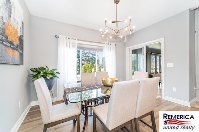 52951 Royal Park Ave, Utica, MI 48315 - dining space with a chandelier, light wood-style flooring, and healthy amount of natural light
