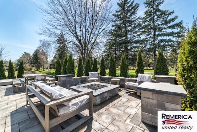 52951 Royal Park Ave, Utica, MI 48315 - view of patio / terrace with a fire pit and view of wooded area