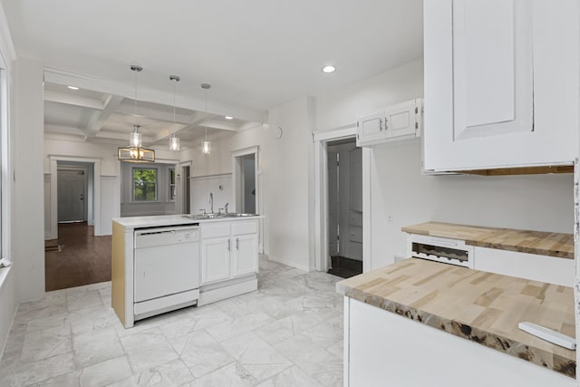 3008 Lothrop St, Detroit, MI 48206 - kitchen with dishwasher, butcher block countertops, coffered ceiling, recessed lighting, and white cabinetry