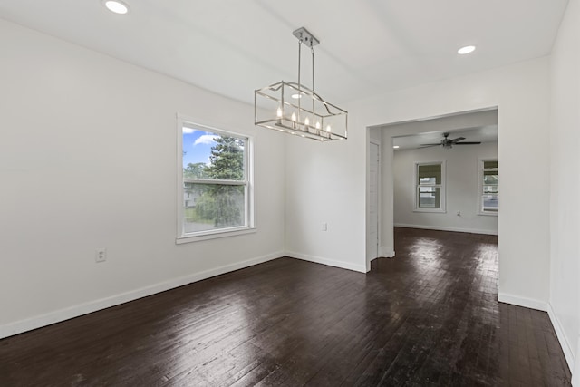 3008 Lothrop St, Detroit, MI 48206 - empty room with hardwood / wood-style floors, recessed lighting, and a chandelier
