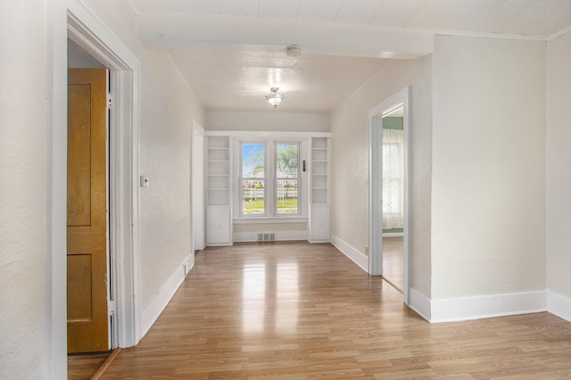 255 E Corey St, Bronson, MI 49028 - spare room featuring light wood-style floors, baseboards, and a smoke detector