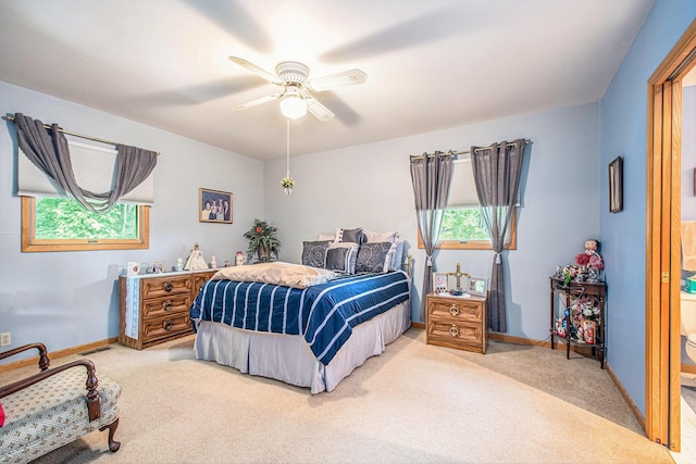50041 David Dr, Dowagiac, MI 49047 - bedroom with light colored carpet, multiple windows, and ceiling fan
