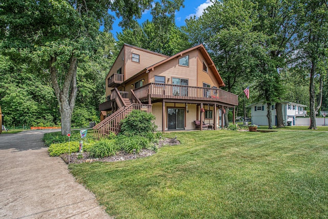 50041 David Dr, Dowagiac, MI 49047 - rustic home with stairway, a wooden deck, and a front yard