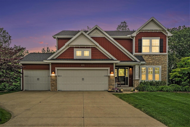 3935 Riley Rdg, Portage, MI 49024 - craftsman-style home with stone siding, a front yard, concrete driveway, and an attached garage