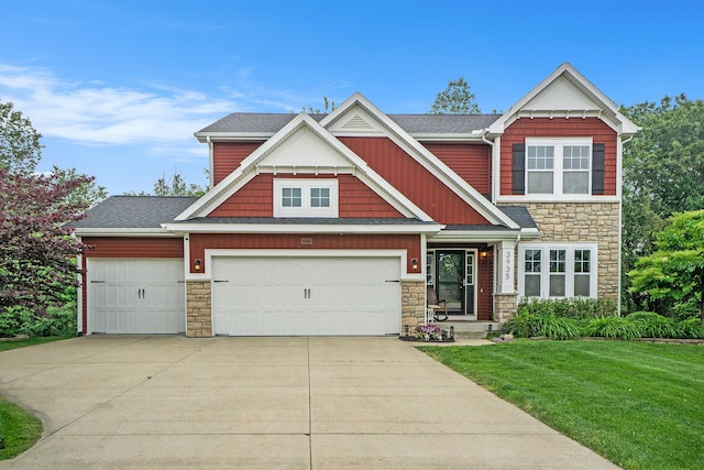 3935 Riley Rdg, Portage, MI 49024 - craftsman inspired home featuring stone siding, a front lawn, driveway, and an attached garage