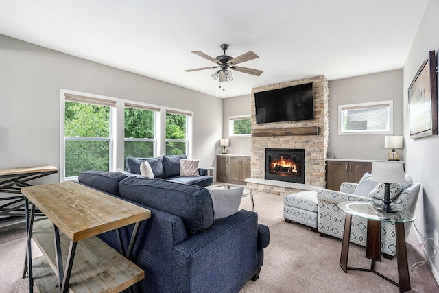 3935 Riley Rdg, Portage, MI 49024 - carpeted living room with a ceiling fan and a fireplace
