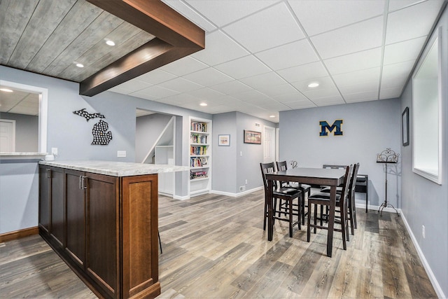 3935 Riley Rdg, Portage, MI 49024 - dining room featuring wood finished floors, built in shelves, and recessed lighting