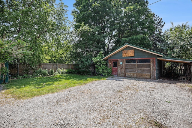 106 E Mechanic St, Yale, MI 48097 - garage featuring a detached garage and driveway