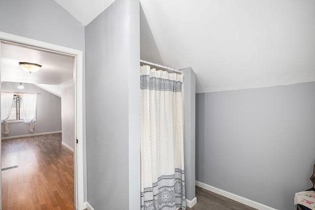106 E Mechanic St, Yale, MI 48097 - bathroom featuring lofted ceiling and wood finished floors