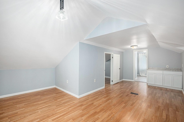 106 E Mechanic St, Yale, MI 48097 - bonus room with lofted ceiling and light wood-type flooring