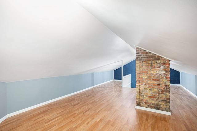 106 E Mechanic St, Yale, MI 48097 - additional living space featuring wood finished floors and lofted ceiling