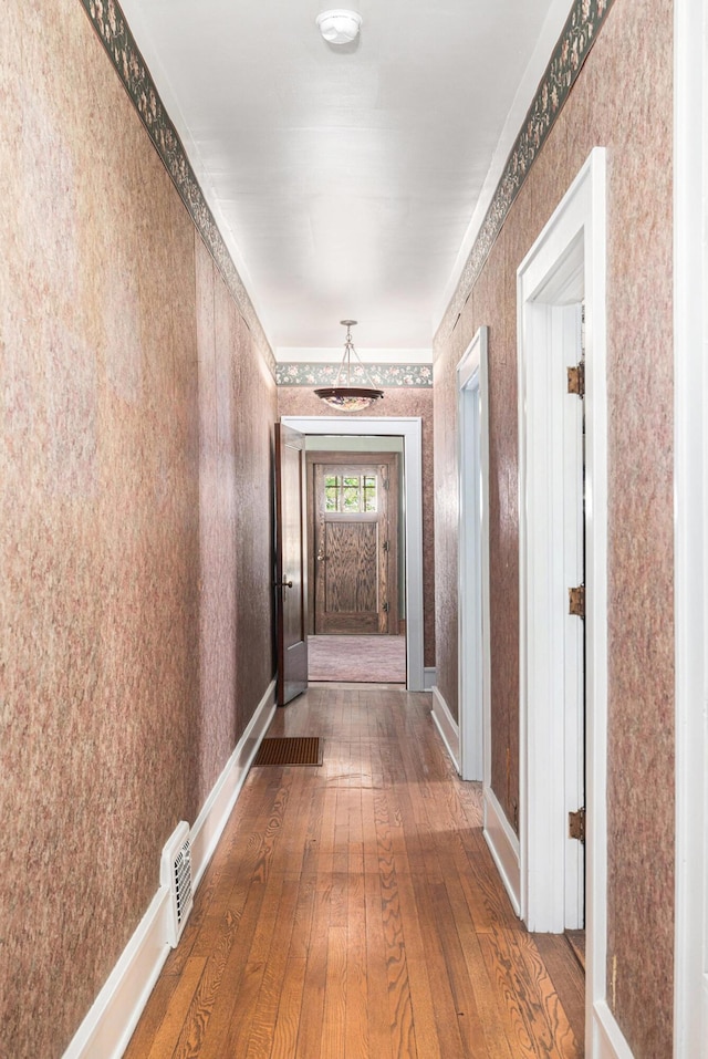 106 E Mechanic St, Yale, MI 48097 - hall featuring hardwood / wood-style flooring and wallpapered walls