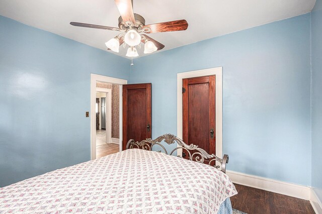 106 E Mechanic St, Yale, MI 48097 - bedroom with wood finished floors and a ceiling fan