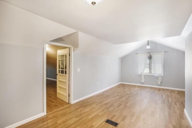 106 E Mechanic St, Yale, MI 48097 - additional living space featuring light wood-style flooring and lofted ceiling