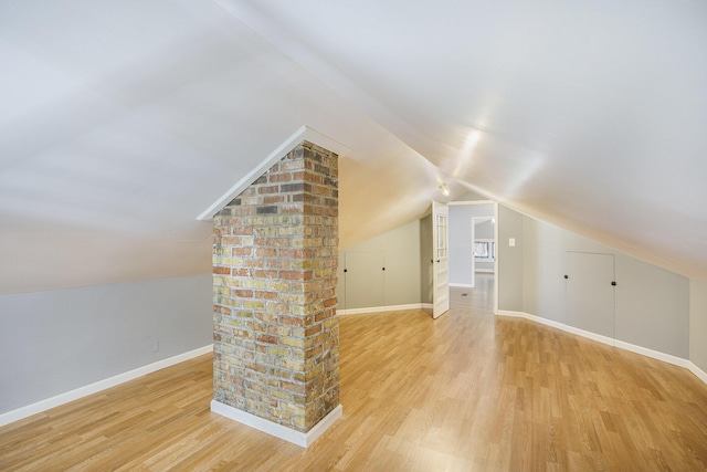 106 E Mechanic St, Yale, MI 48097 - bonus room featuring light wood-style floors and vaulted ceiling