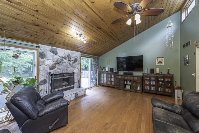 7715 Marquis Dr, Dexter, MI 48130 - living room featuring a fireplace, wood ceiling, ceiling fan, wood finished floors, and high vaulted ceiling