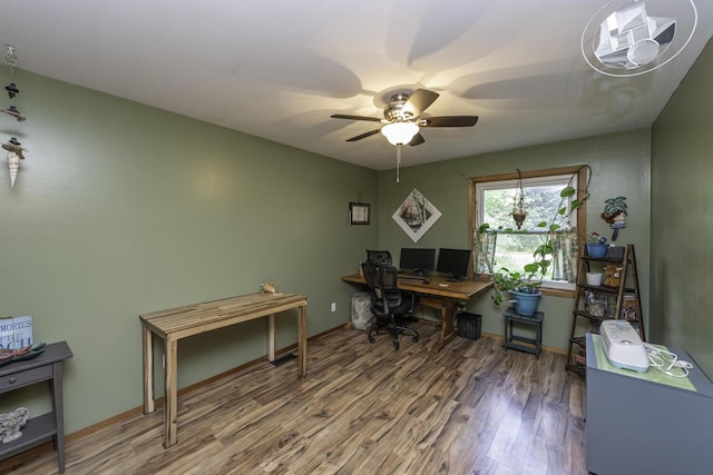 7715 Marquis Dr, Dexter, MI 48130 - office area with ceiling fan and wood finished floors
