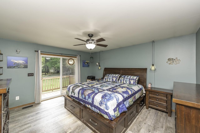 7715 Marquis Dr, Dexter, MI 48130 - bedroom featuring access to outside, light wood-style floors, and ceiling fan