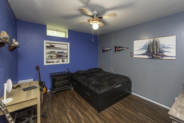 7715 Marquis Dr, Dexter, MI 48130 - bedroom with wood finished floors, a ceiling fan, and a desk