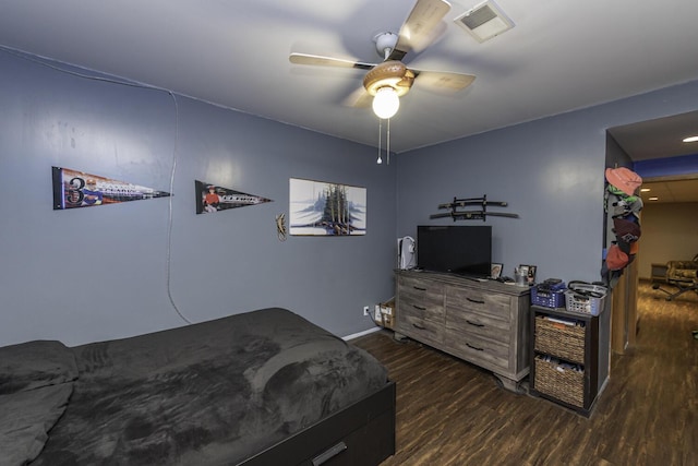 7715 Marquis Dr, Dexter, MI 48130 - bedroom with dark wood-style floors and a ceiling fan
