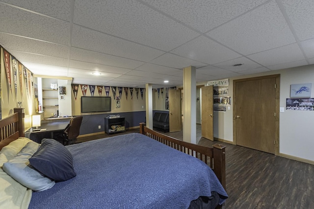 7715 Marquis Dr, Dexter, MI 48130 - bedroom featuring wood finished floors and a paneled ceiling