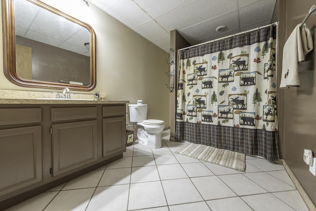 7715 Marquis Dr, Dexter, MI 48130 - full bath with a paneled ceiling, tile patterned floors, vanity, and a shower with shower curtain