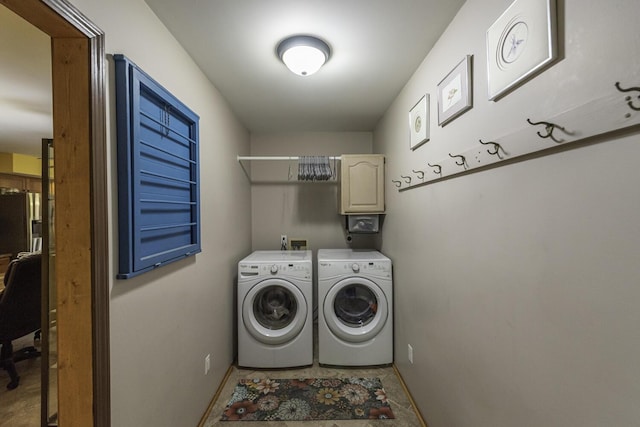 7715 Marquis Dr, Dexter, MI 48130 - laundry room with separate washer and dryer and baseboards