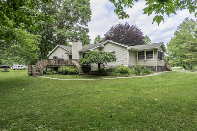 7715 Marquis Dr, Dexter, MI 48130 - view of side of home featuring a wooden deck, a lawn, and a chimney