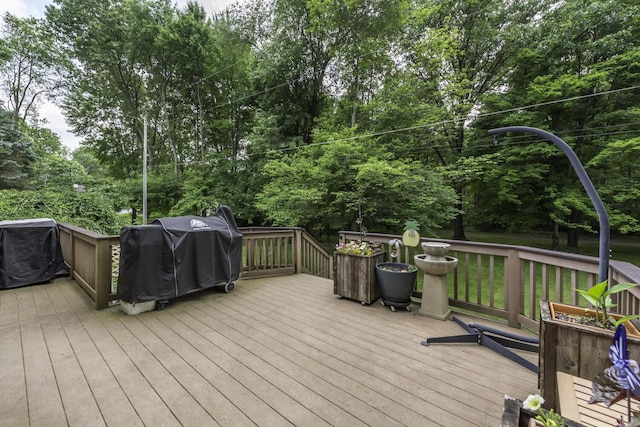 7715 Marquis Dr, Dexter, MI 48130 - deck featuring a grill