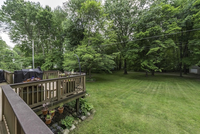7715 Marquis Dr, Dexter, MI 48130 - view of green lawn with a deck