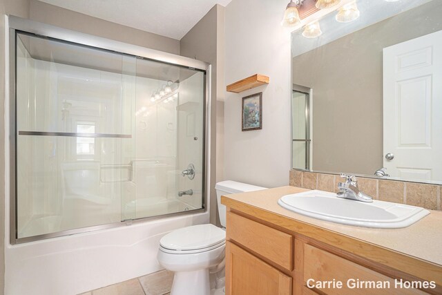 3089 E Crystal Waters Dr Unit 7, Holland, MI 49424 - bathroom featuring vanity and shower / bath combination with glass door