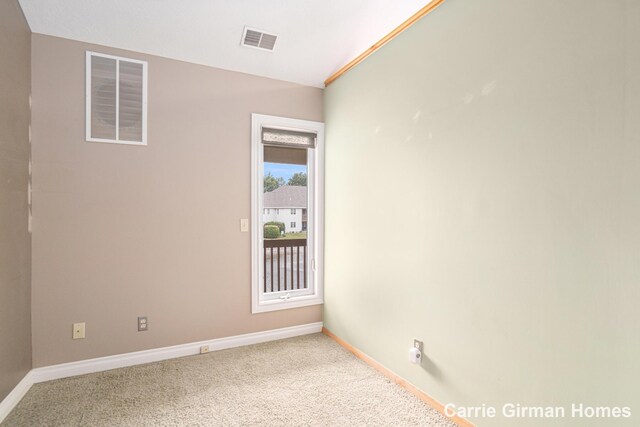 3089 E Crystal Waters Dr Unit 7, Holland, MI 49424 - carpeted spare room with baseboards
