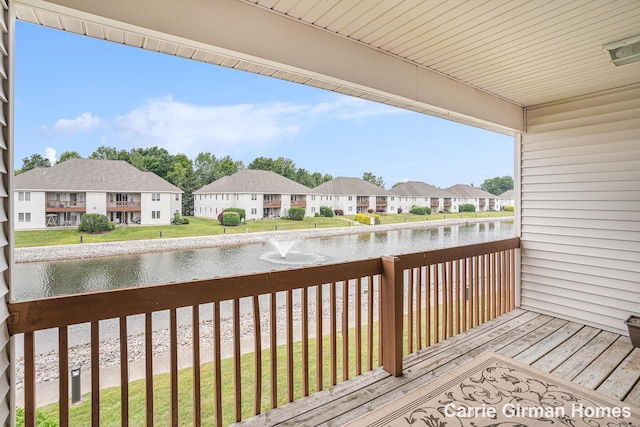 3089 E Crystal Waters Dr Unit 7, Holland, MI 49424 - balcony with a water view and a residential view