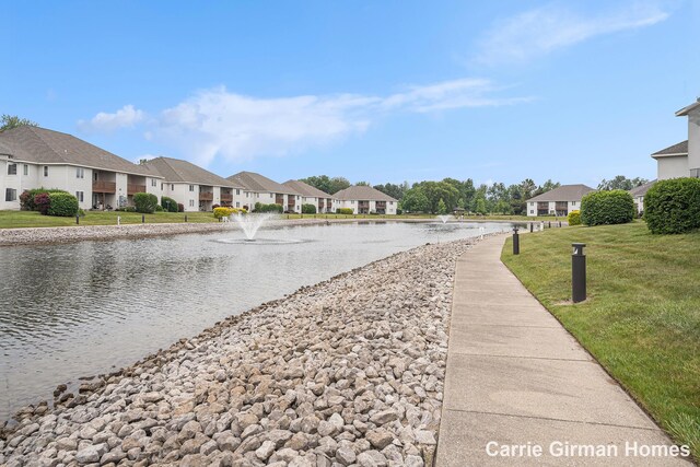 3089 E Crystal Waters Dr Unit 7, Holland, MI 49424 - water view featuring nearby suburban area