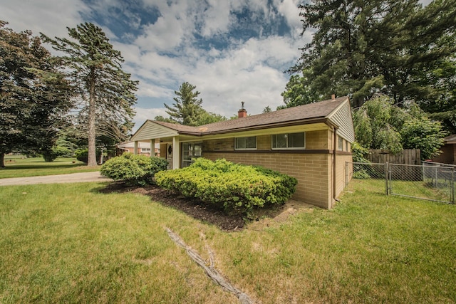 25255 Orchard Grove St, Southfield, MI 48033 - ranch-style house with brick siding and a chimney