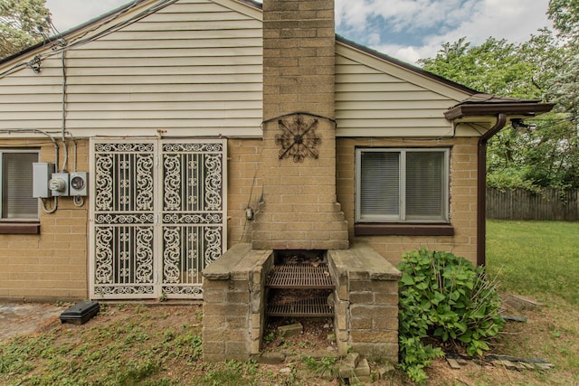 25255 Orchard Grove St, Southfield, MI 48033 - exterior space with brick siding and a chimney