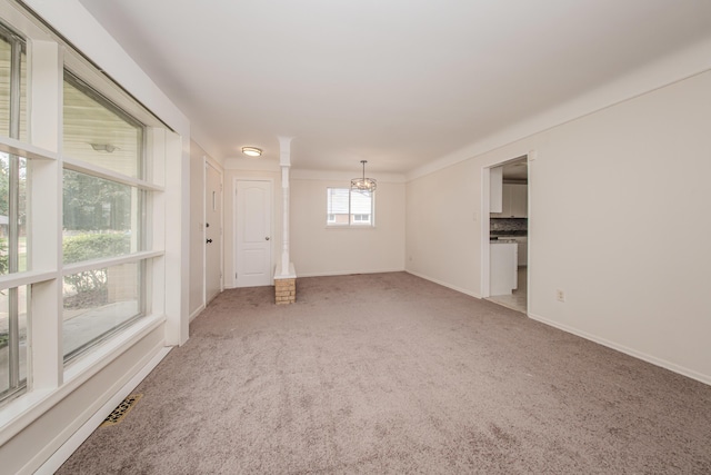 25255 Orchard Grove St, Southfield, MI 48033 - unfurnished room featuring a chandelier and carpet