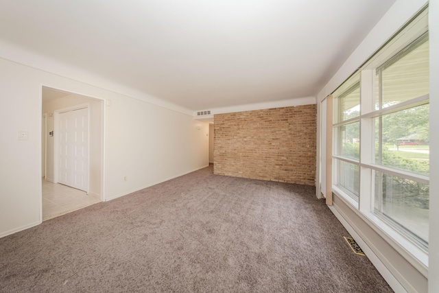 25255 Orchard Grove St, Southfield, MI 48033 - carpeted spare room with brick wall and baseboards