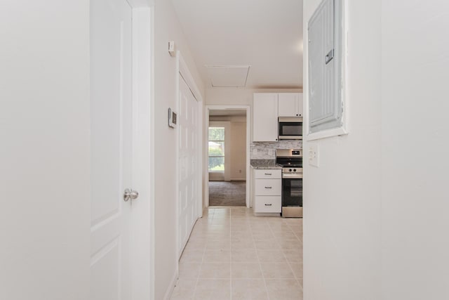 25255 Orchard Grove St, Southfield, MI 48033 - hall with light tile patterned floors and baseboards