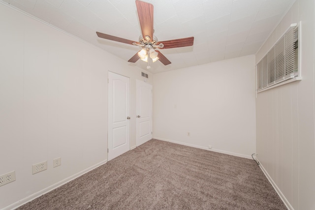 25255 Orchard Grove St, Southfield, MI 48033 - carpeted spare room featuring a ceiling fan and crown molding