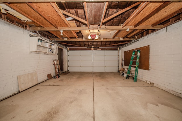 25255 Orchard Grove St, Southfield, MI 48033 - garage featuring a garage door opener