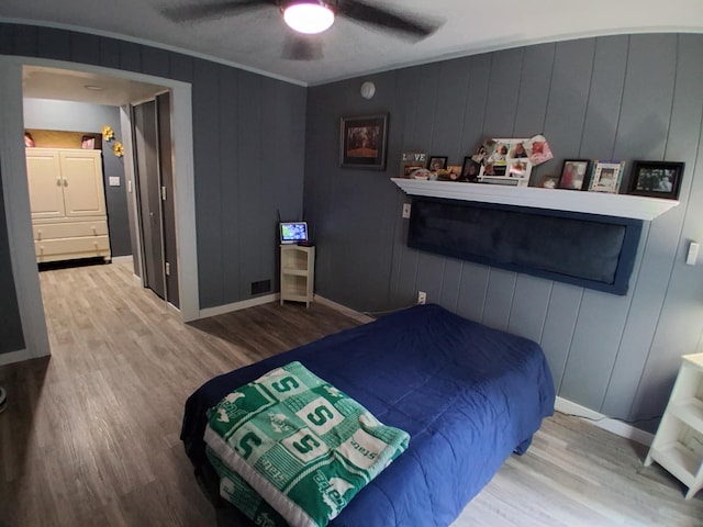 5397 E 80th St, Newaygo, MI 49337 - bedroom featuring wood finished floors, ornamental molding, and a ceiling fan