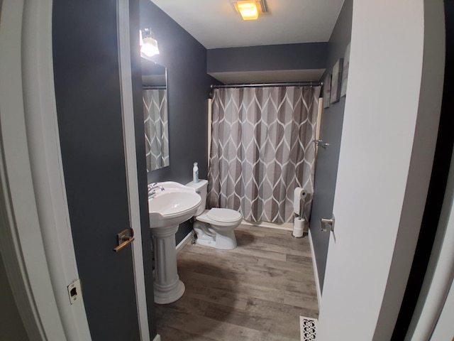 5397 E 80th St, Newaygo, MI 49337 - bathroom with wood finished floors and curtained shower