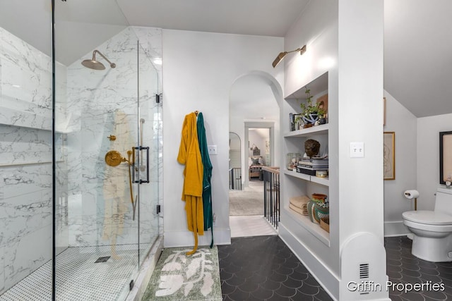 339 W Main Ave, Zeeland, MI 49464 - bathroom featuring toilet and a marble finish shower