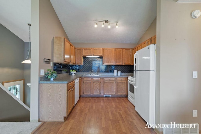 430 6th St NE, Cedar Springs, MI 49319 - kitchen with white appliances, light wood-type flooring, backsplash, and lofted ceiling