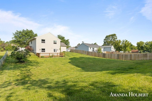 430 6th St NE, Cedar Springs, MI 49319 - fenced backyard featuring a wooden deck